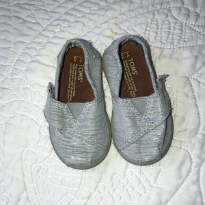 Toms toddler shoes. Size T3. Silver. Velcro strap slip on shoes.